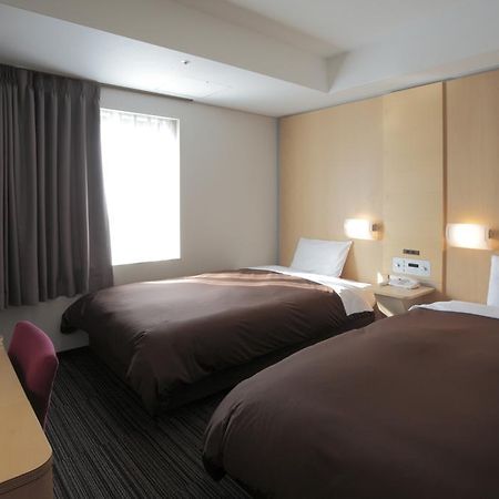 Bluewave Inn Yotsubashi Osaca Quarto foto