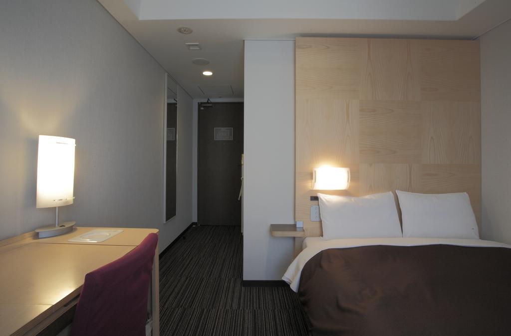 Bluewave Inn Yotsubashi Osaca Quarto foto