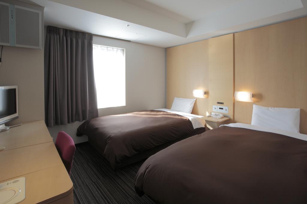 Bluewave Inn Yotsubashi Osaca Quarto foto